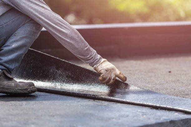 Professional Interior Drainage System technician working in Port Jefferson Station, NY